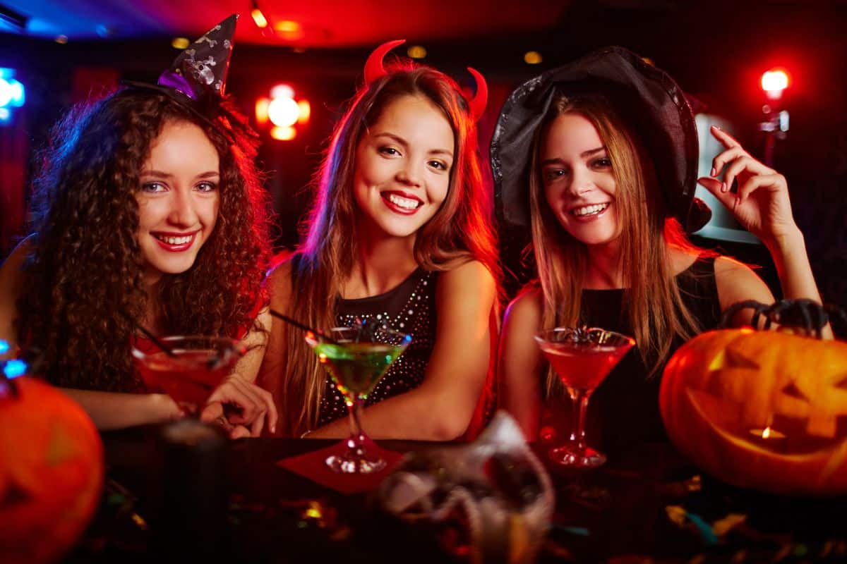 A group of women in costumes for a halloween party