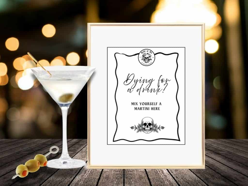 Cocktail with olives and decorative sign for bride or die bachelorette